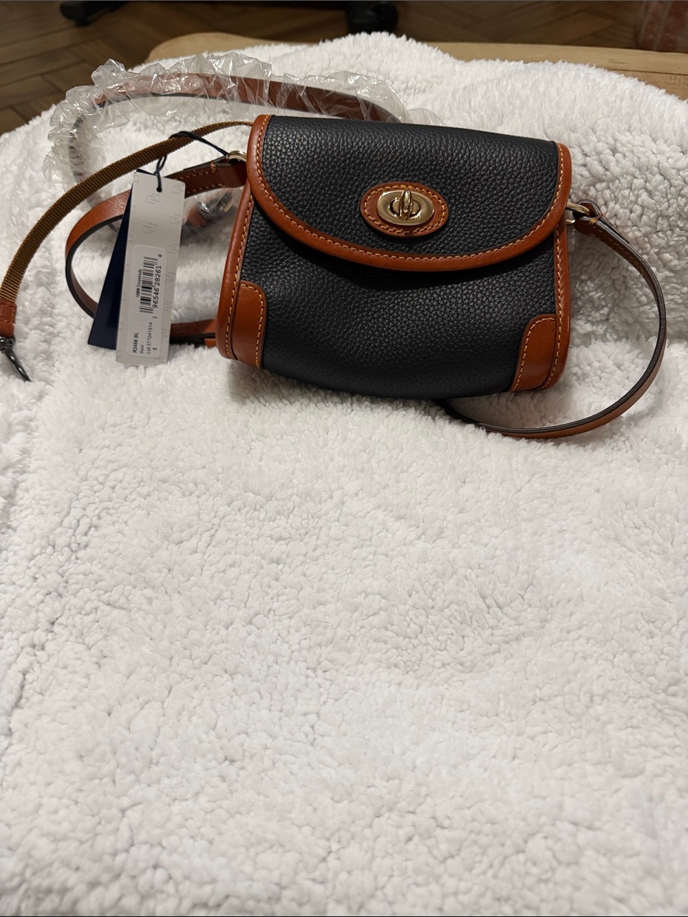 Pebbled Black Crossbody with Tan Trim and Turn-Lock